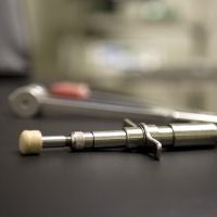 chiropractic tool close up called activator on desk